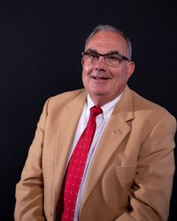 Dr. Charles R. Looney